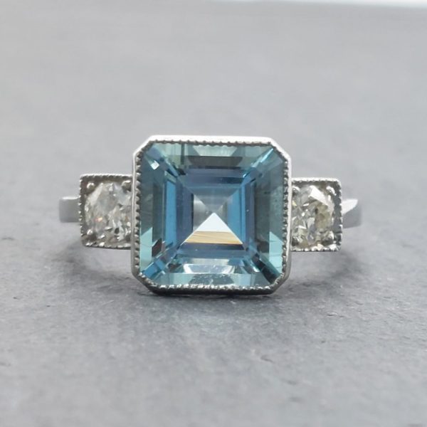 3ct Octagonal Cut Aquamarine and Diamond Three Stone Ring in Platinum