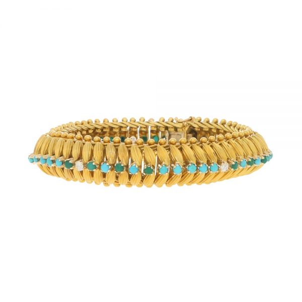 Vintage 1960s Yellow Gold Bracelet with Turquoise and Diamonds; handcrafted 18ct yellow gold bracelet with 3D textured leaf design and central row of cabochon turquoise alternating with 0.30cts round brilliant-cut diamonds, accented with borders of spherical gold beads