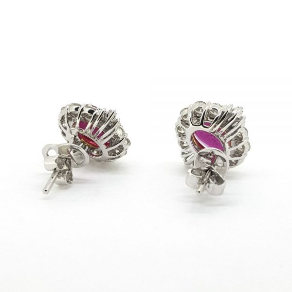 Contemporary 2.82ct Oval Ruby and Diamond Cluster Earrings