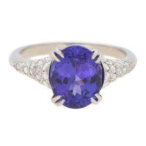 3.61ct Oval Tanzanite and Diamond Dress Ring in Platinum; central 3.61 carat oval cut tanzanite with 0.20ct pavé diamond set shoulders