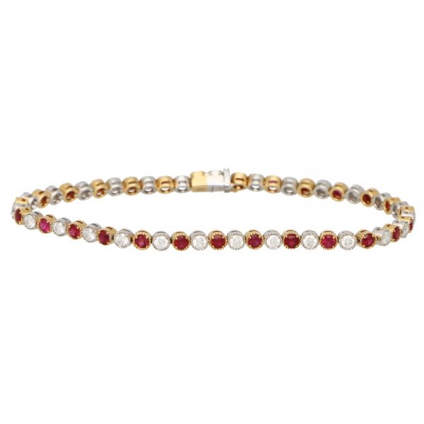 Contemporary Ruby and Diamond Line Tennis Bracelet set with alternating 1.44cts brilliant diamond and 1.65cts rubies rubover set in 18ct white and yellow gold articulated links
