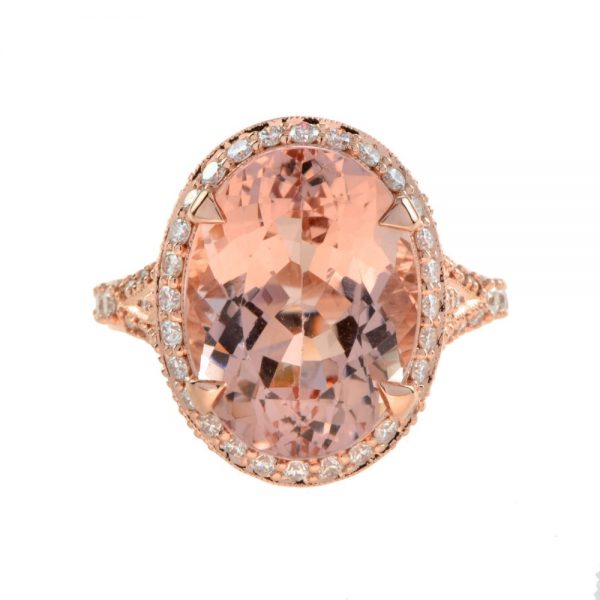 9.60ct Oval Morganite and Diamond Cluster Cocktail Ring in 18ct Rose Gold; 9.63ct oval morganite with a diamond surround accented with diamond-set split shoulders