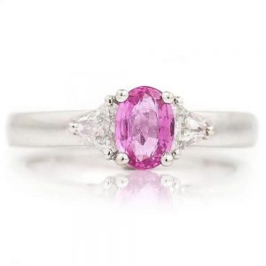 0.84ct Pink Sapphire and Trilliant Diamond Three Stone Ring in 18ct White Gold