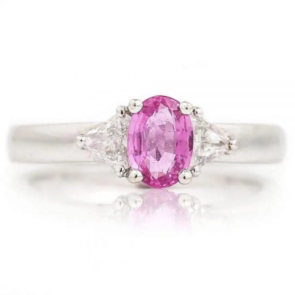 0.84ct Pink Sapphire and Trilliant Diamond Three Stone Ring in 18ct White Gold