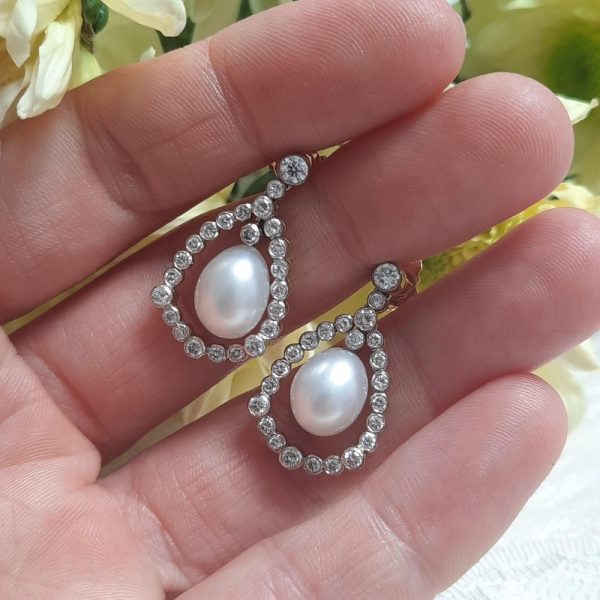 Pearl and diamond cluster drop earrings