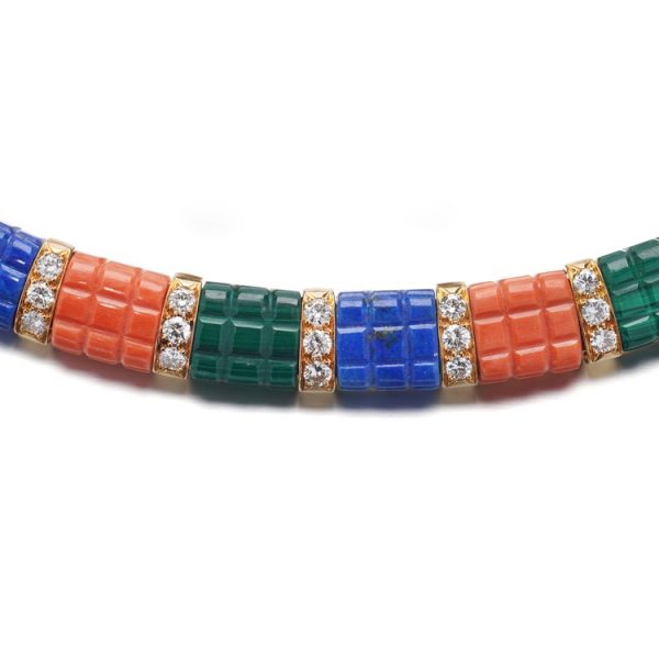 Van Cleef and Arpels Multi Gemstone and Diamond Set 18ct Gold Necklace; chunky 18ct yellow gold collar necklace set with panels of lapis lazuli, malachite and coral accented with 2.10cts brilliant-cut diamonds