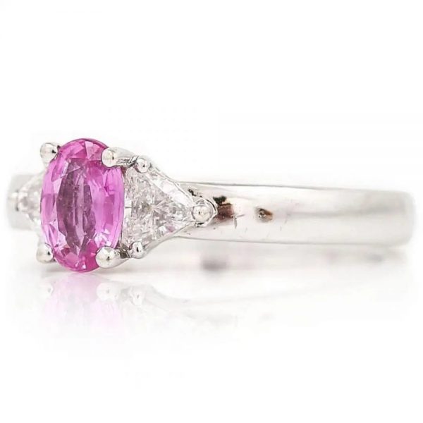 0.84ct Pink Sapphire and Trilliant Diamond Three Stone Ring in 18ct White Gold