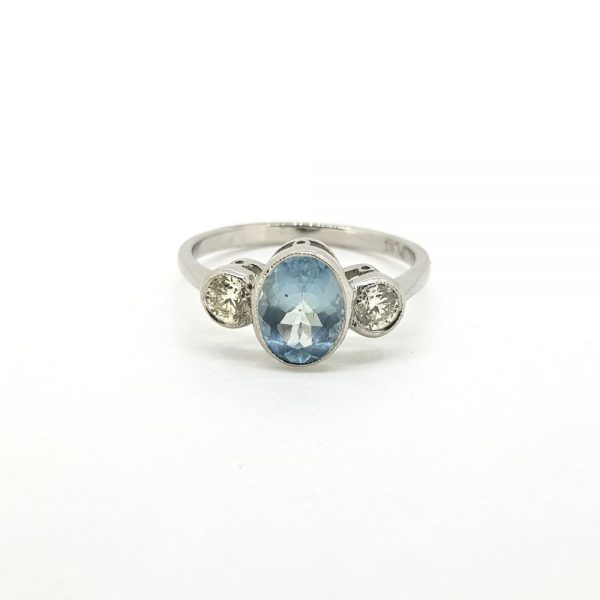 1.10ct Oval Aquamarine and Diamond Three Stone Ring