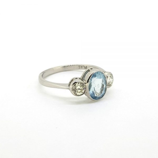 1.10ct Oval Aquamarine and Diamond Three Stone Ring