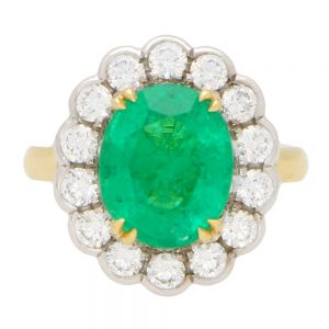 3.96ct Oval Cut Emerald and Diamond Cluster Ring