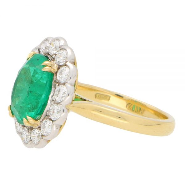 3.96ct Oval Cut Emerald and Diamond Cluster Ring