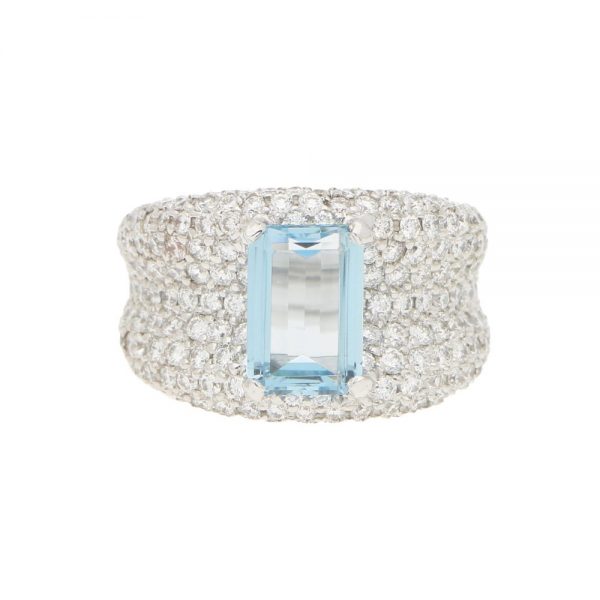An incredibly sparkly 1.93ct emerald cut aquamarine and diamond bombe ring set in 18ct white gold.
