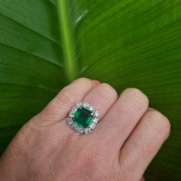 4ct Zambian Octagonal Emerald and Diamond Cluster Ring in Platinum