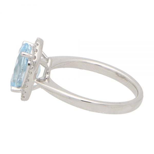 3.39ct Oval Aquamarine and Diamond Halo Cluster Ring
