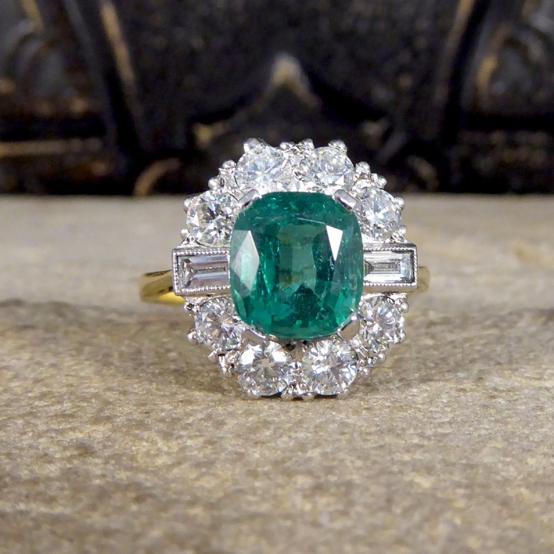 Contemporary 2.08ct Emerald and 1.25ct Diamond Cluster Ring