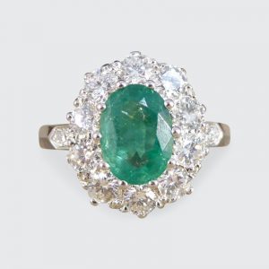 1.30ct Emerald and Diamond Cluster Ring in Platinum