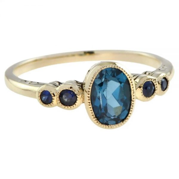 1.15ct Oval Blue Topaz and Sapphire Five Stone Ring