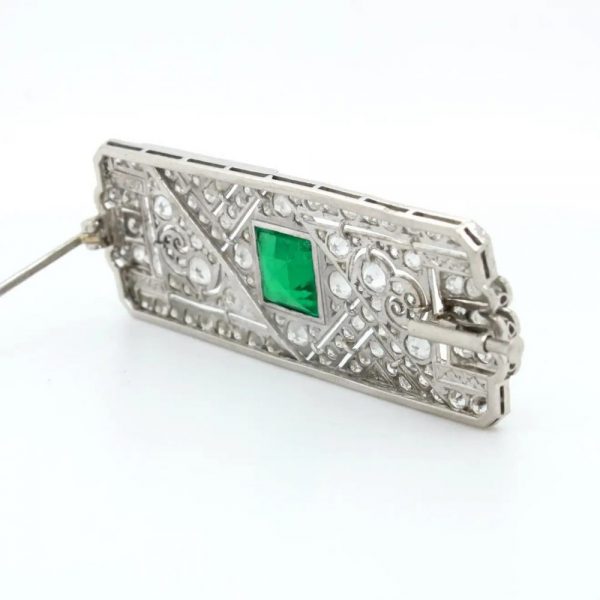 Art Deco Colombian Emerald Onyx and Old Cut Diamond Brooch in Platinum