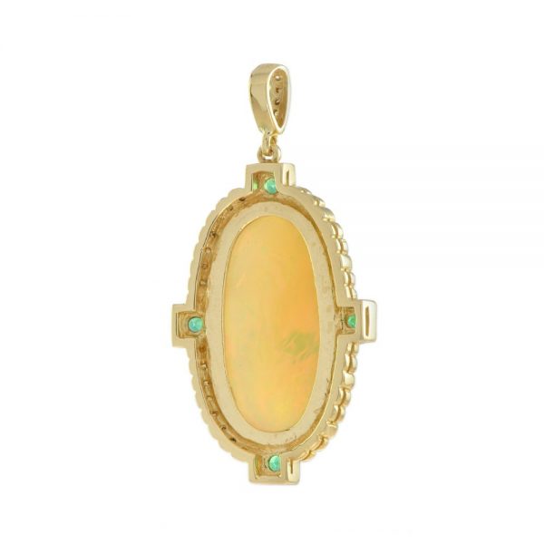 7.94ct Oval Cabochon Ethiopian Opal Pendant with Diamond and Emerald Cluster