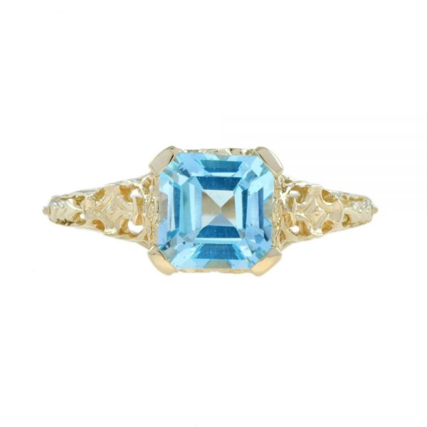 2.7ct Octagonal Cut Blue Topaz and Yellow Gold Filigree Ring