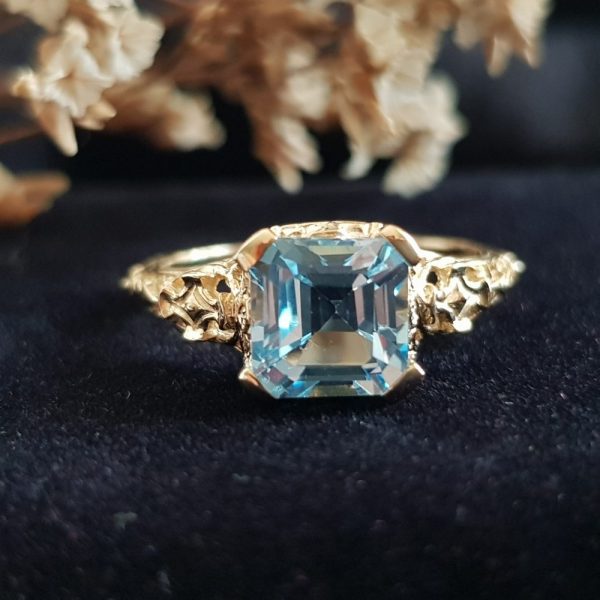 2.7ct Octagonal Cut Blue Topaz and Yellow Gold Filigree Ring