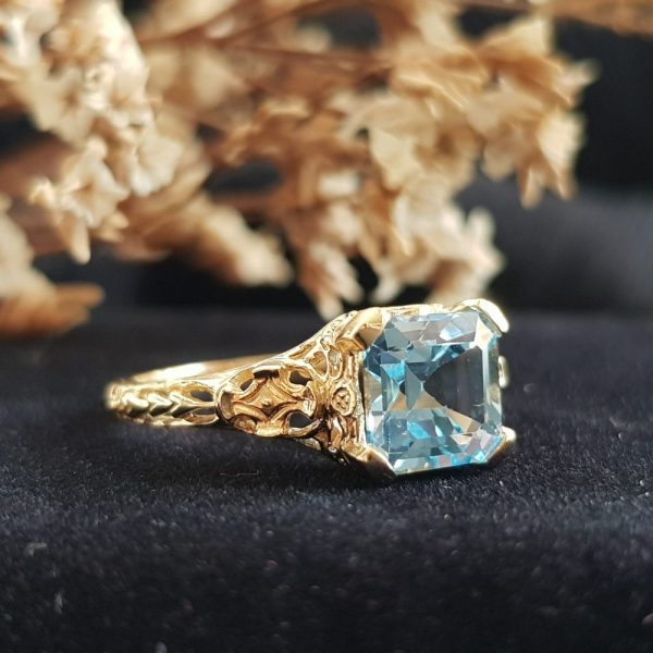 2.7ct Octagonal Cut Blue Topaz and Yellow Gold Filigree Ring