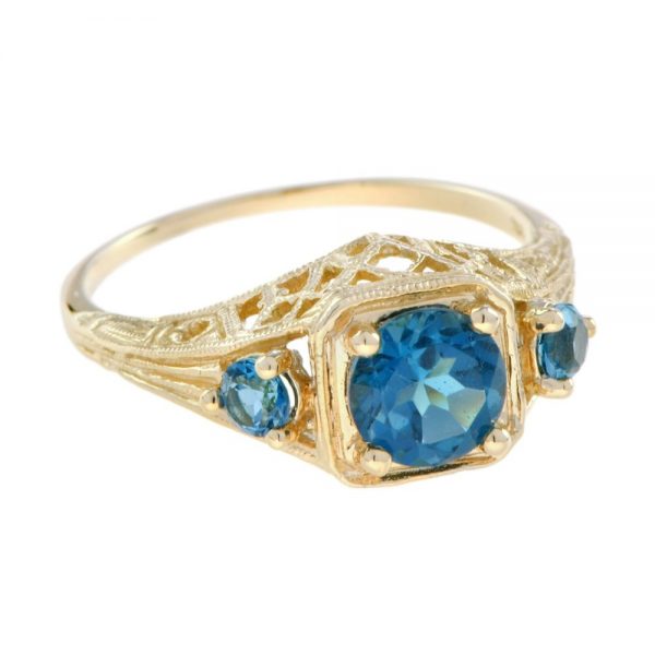 Blue Topaz Three Stone Filigree Yellow Gold Ring