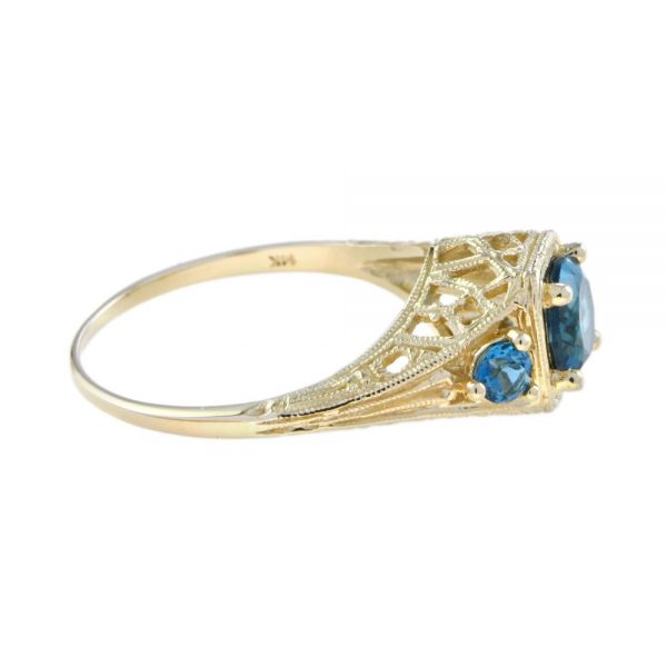 Blue Topaz Three Stone Filigree Yellow Gold Ring