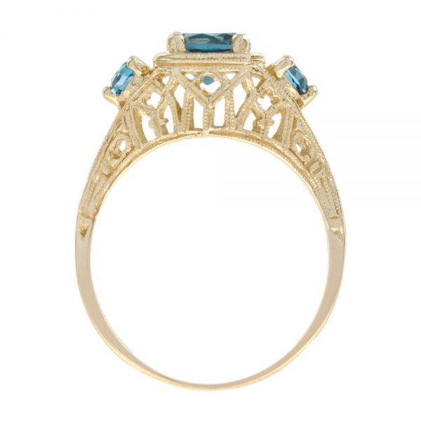 Blue Topaz Three Stone Filigree Yellow Gold Ring