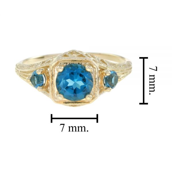 Blue Topaz Three Stone Filigree Yellow Gold Ring