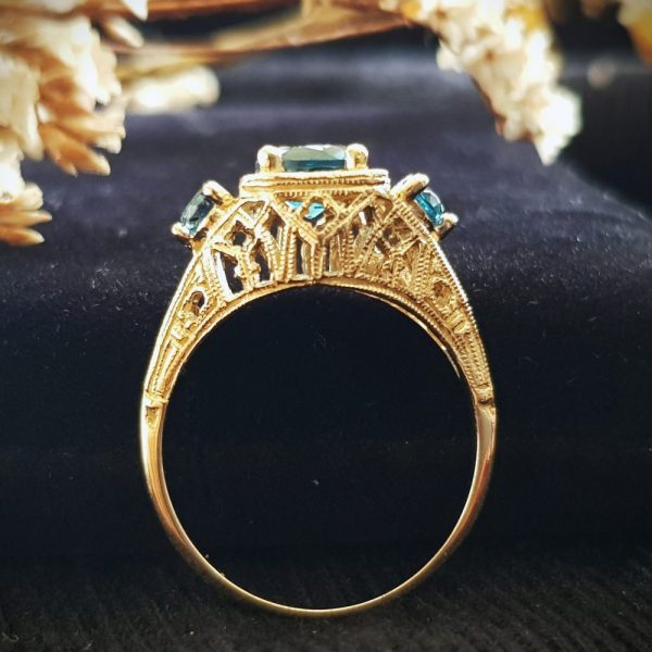 Blue Topaz Three Stone Filigree Yellow Gold Ring