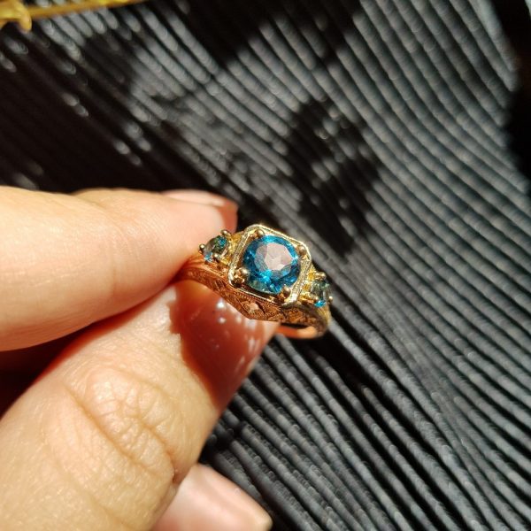 Blue Topaz Three Stone Filigree Yellow Gold Ring