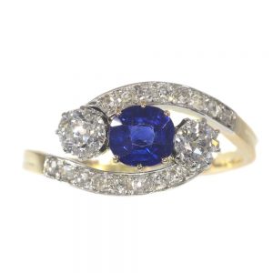 Antique Belle Epoque Sapphire and Diamond Three Stone Crossover Ring