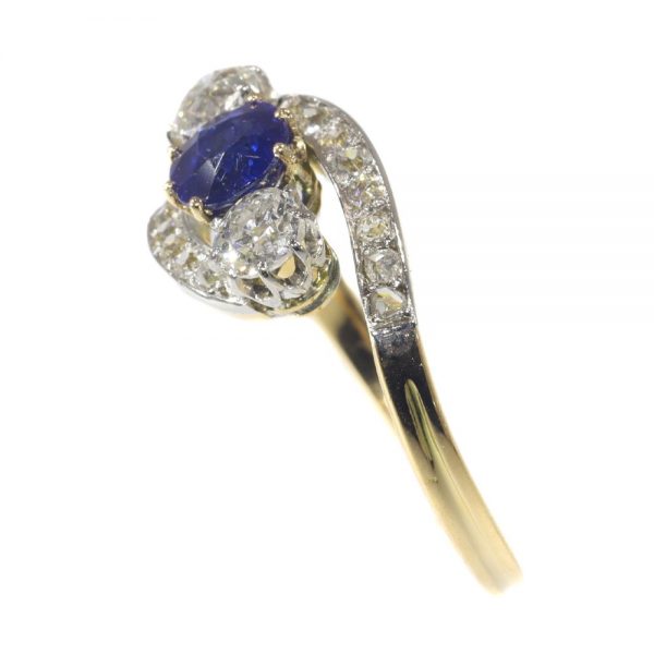 Antique Belle Epoque Sapphire and Diamond Three Stone Crossover Ring