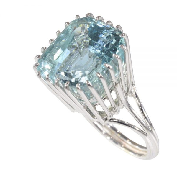 Vintage 16cts Aquamarine Cocktail Ring in 18ct White Gold; large 16ct cushion-shaped square aquamarine in 18ct white gold with decorative pierced under-gallery. Circa 1950s