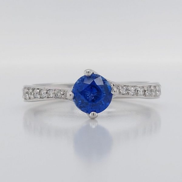 Modern 0.70ct Sapphire and Diamond Twist Setting Ring