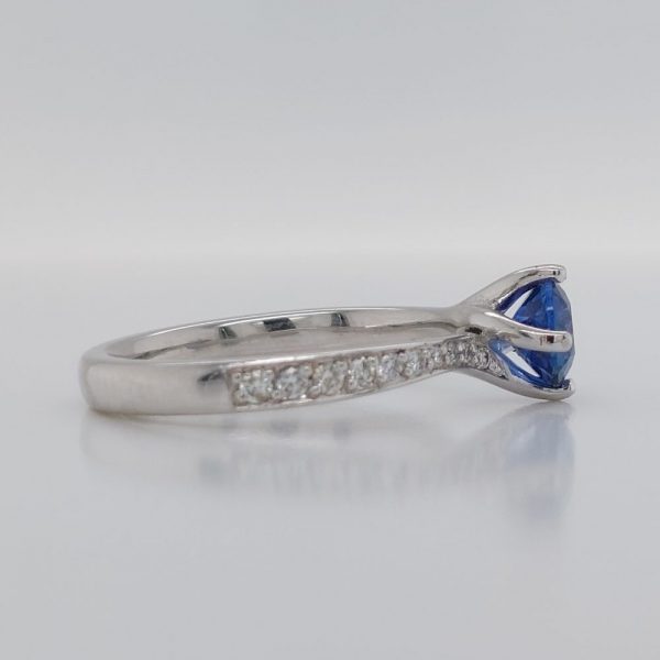 Modern 0.70ct Sapphire and Diamond Twist Setting Ring