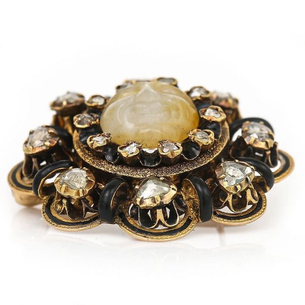 Antique Victorian Man in the Moon Feldspar Brooch with Rose Cut Diamonds and Black Enamel in 18ct yellow gold. Circa 1850