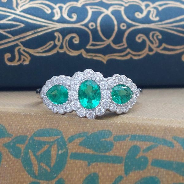 Triple 0.98ct Emerald and Diamond Cluster Ring