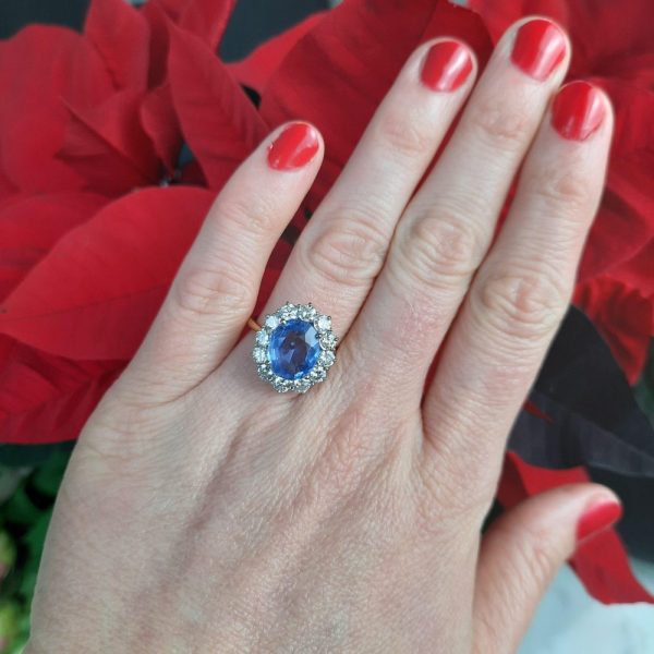 4ct Oval Sapphire and Diamond Cluster Ring