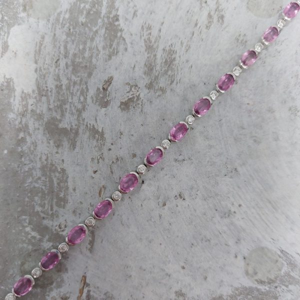 Pink sapphire and diamond tennis bracelet