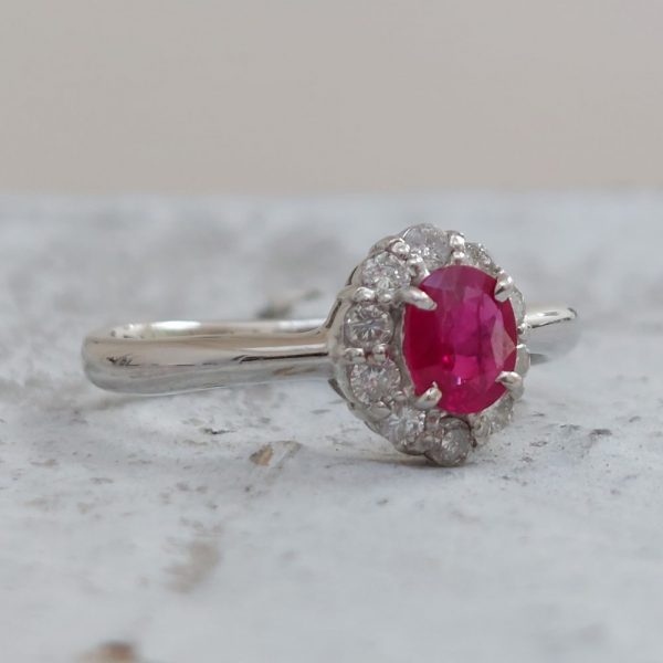 Vintage Oval Ruby and Diamond Cluster Platinum Ring