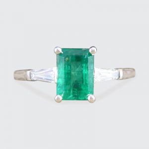 1.03ct Emerald Ring with Tapered Baguette Cut Diamond Shoulders