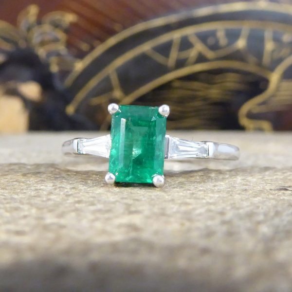 1.03ct Emerald Ring with Tapered Baguette Cut Diamond Shoulders