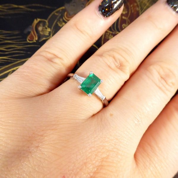 1.03ct Emerald Ring with Tapered Baguette Cut Diamond Shoulders