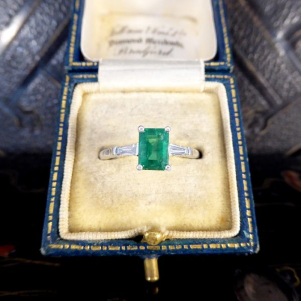 1.03ct Emerald Ring with Tapered Baguette Cut Diamond Shoulders