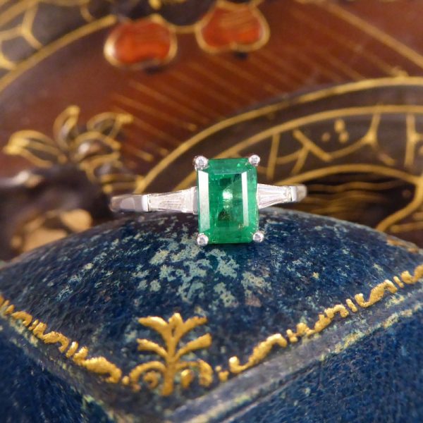 1.03ct Emerald Ring with Tapered Baguette Cut Diamond Shoulders