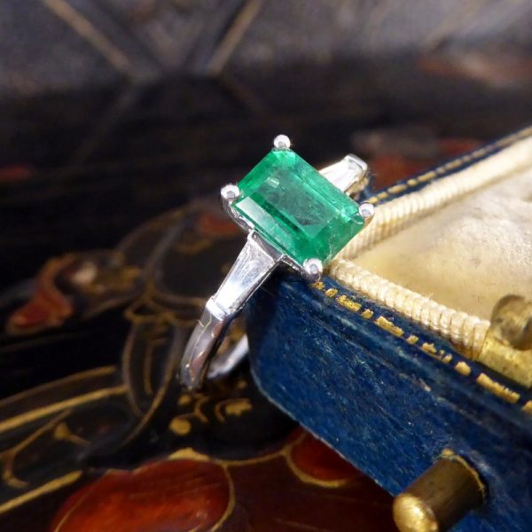 1.03ct Emerald Ring with Tapered Baguette Cut Diamond Shoulders