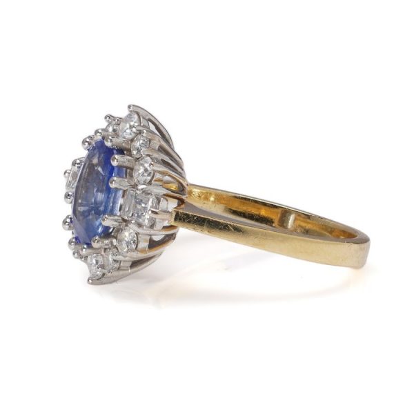 Vintage 1ct Oval Sapphire and Diamond Cluster Engagement Ring