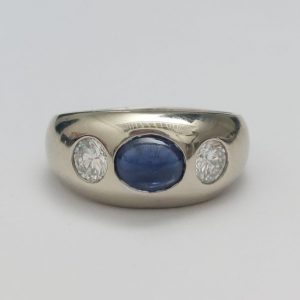 Cabochon Sapphire and Diamond Three Stone Ring